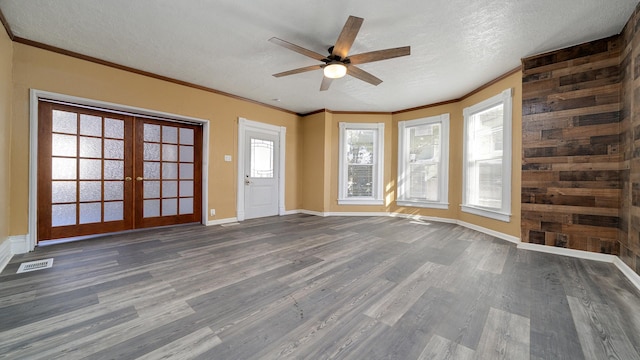 interior space featuring crown molding, dark wood-type flooring, and french doors