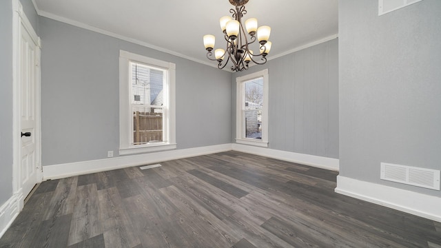 unfurnished dining area with dark hardwood / wood-style flooring, a notable chandelier, crown molding, and plenty of natural light