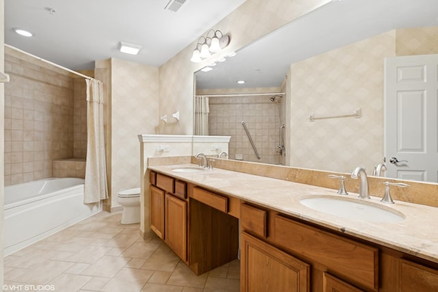 full bathroom featuring vanity, shower / bath combo, and toilet