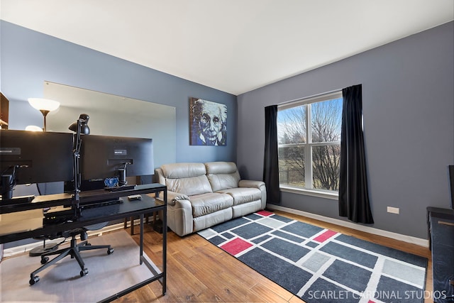 office featuring wood finished floors and baseboards