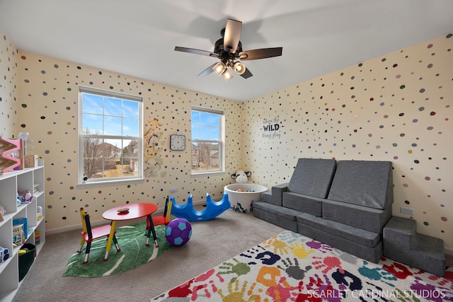 rec room with carpet flooring, ceiling fan, baseboards, and wallpapered walls