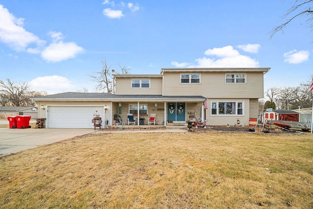 traditional-style home with driveway, a garage, a front lawn, and a porch