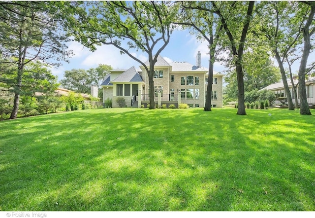 exterior space featuring a front lawn