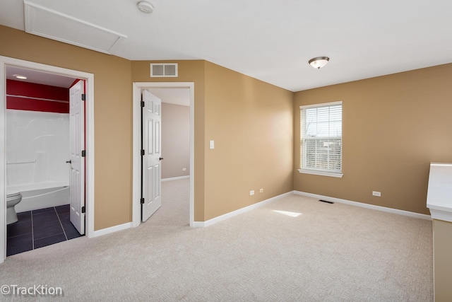 unfurnished bedroom featuring carpet