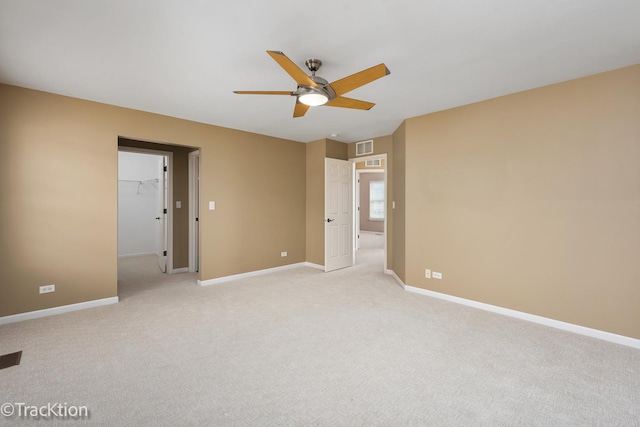 unfurnished bedroom with light carpet and ceiling fan