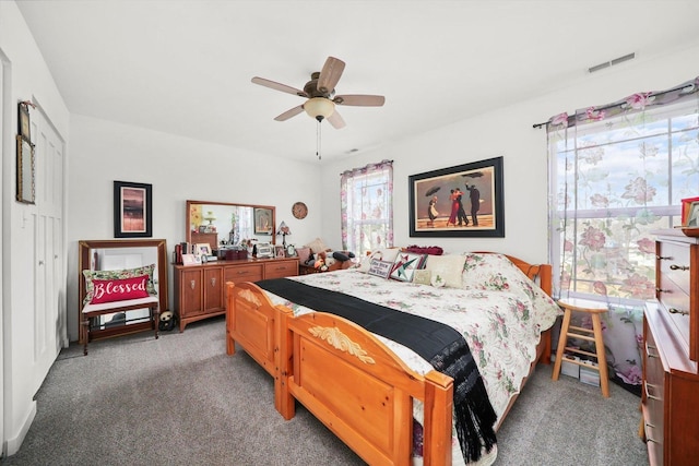 carpeted bedroom with ceiling fan