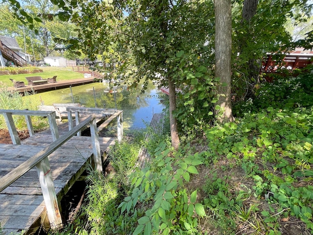 dock area featuring a water view