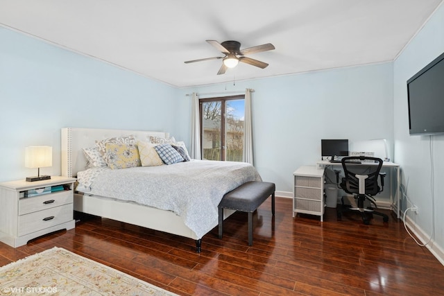 bedroom with dark wood-type flooring, ceiling fan, and baseboards