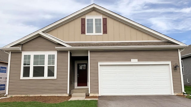 view of front of property with a garage