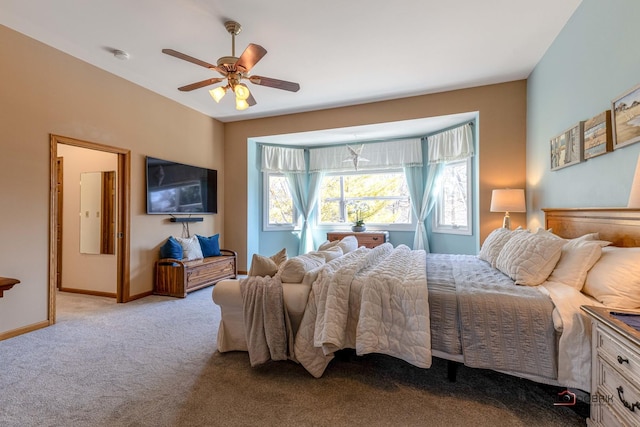 bedroom featuring baseboards, a ceiling fan, and carpet flooring