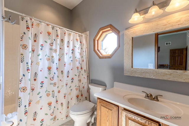 full bath featuring visible vents, toilet, and vanity