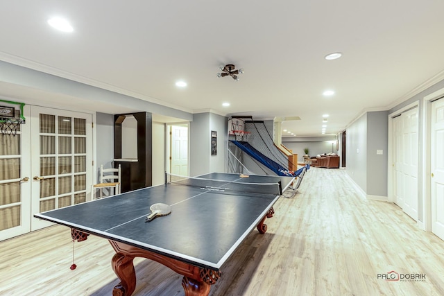 game room featuring ornamental molding, wood finished floors, recessed lighting, french doors, and baseboards