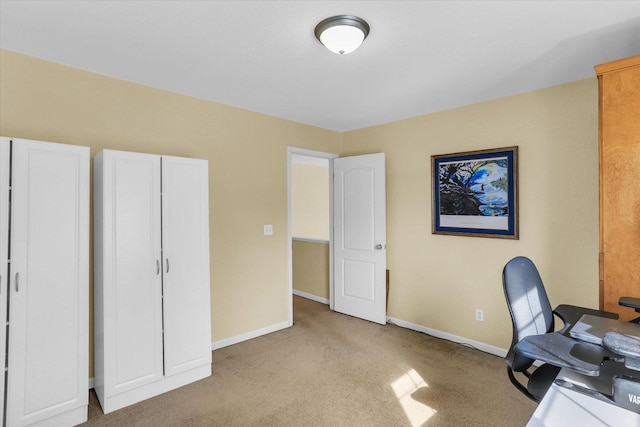 office area with baseboards and light colored carpet