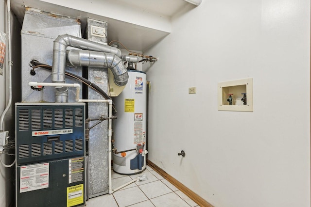 utility room with water heater