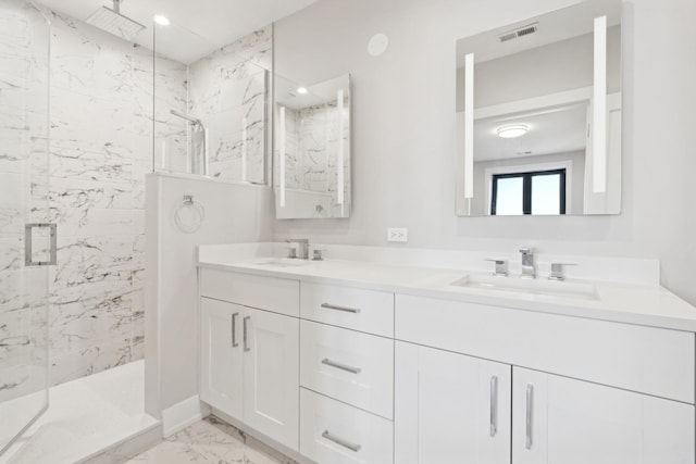 bathroom featuring vanity and walk in shower