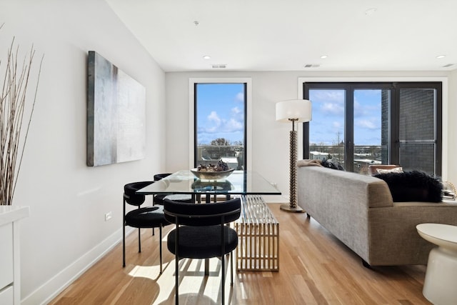 dining room with light hardwood / wood-style flooring