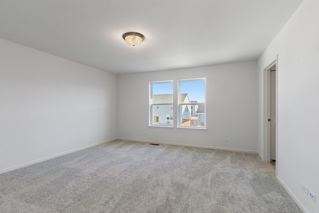 view of carpeted spare room