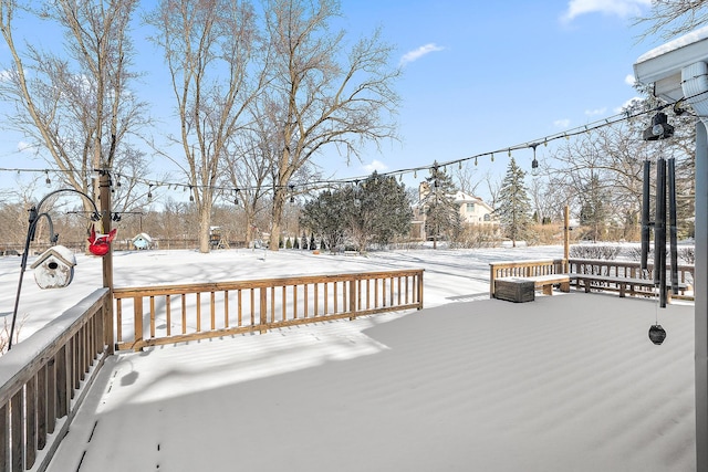 view of snow covered deck