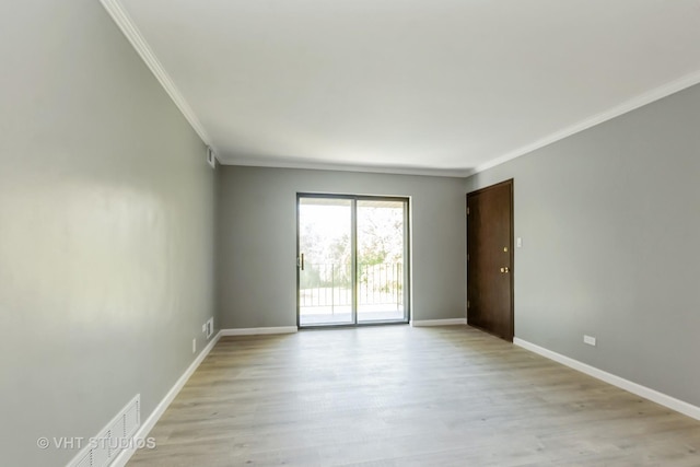 unfurnished room with crown molding and light hardwood / wood-style floors