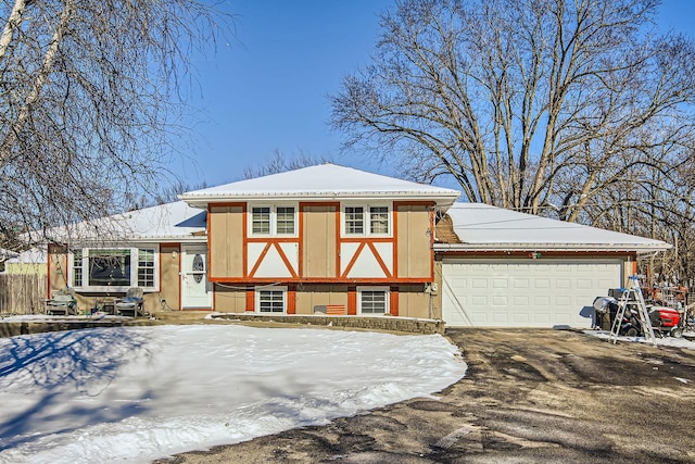 split level home featuring a garage