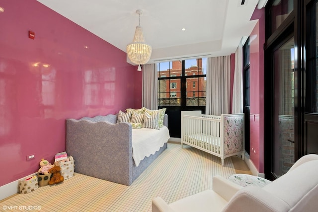 bedroom with a chandelier