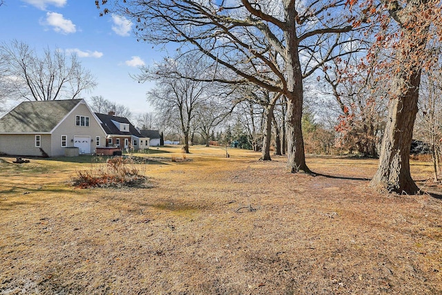 view of yard with a garage