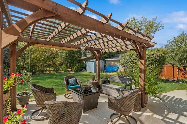 view of patio / terrace featuring a shed, a pergola, and an outdoor hangout area