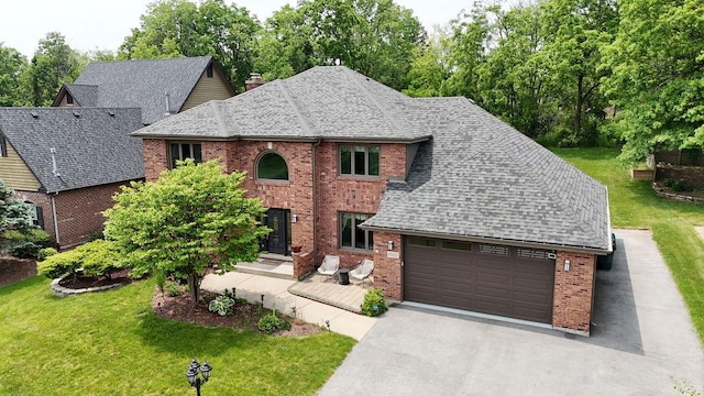 15022 S Woodcrest Ave, Homer Glen, IL 60491 - view of front facade featuring brick siding, a shingled roof, a garage, and a front yard
