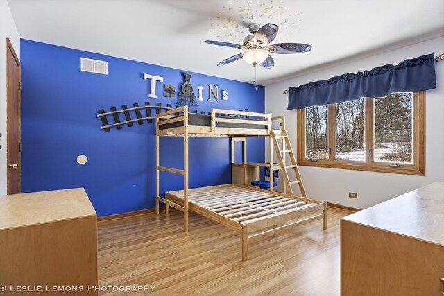 15022 S Woodcrest Ave, Homer Glen, IL 60491 - bedroom with baseboards and wood finished floors