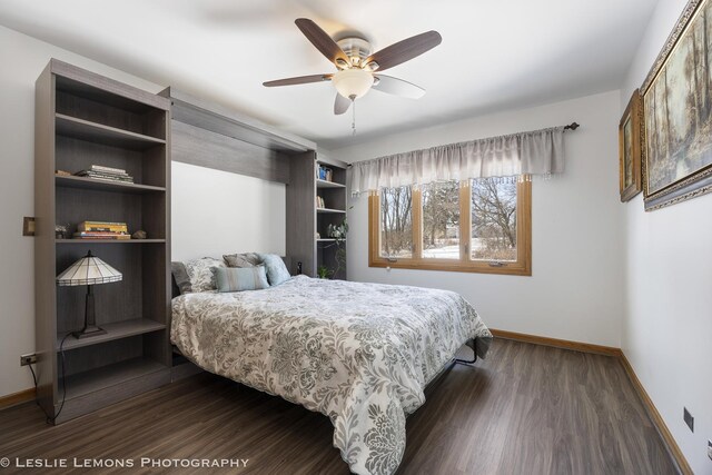 15022 S Woodcrest Ave, Homer Glen, IL 60491 - bedroom featuring dark wood finished floors and ceiling fan
