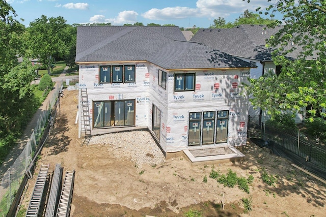 4601 Wilson Ave, Downers Grove, IL 60515 - back of house featuring stone siding and a shingled roof