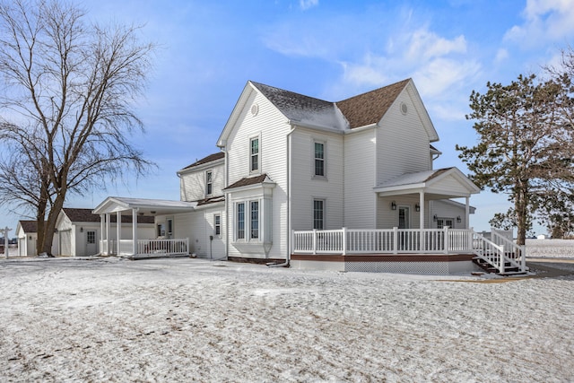 back of house featuring a wooden deck