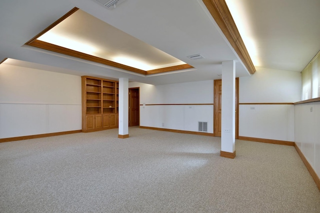 finished basement with light carpet and visible vents