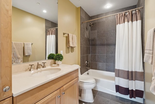 full bathroom with tile patterned flooring, vanity, shower / tub combo with curtain, and toilet