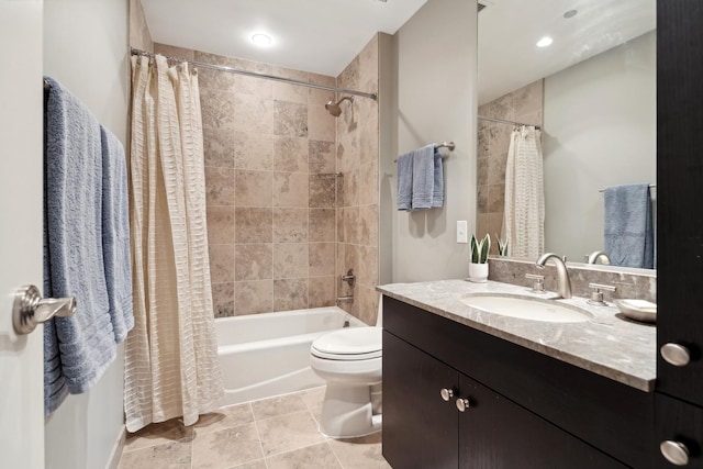 full bathroom featuring shower / bath combination with curtain, vanity, and toilet