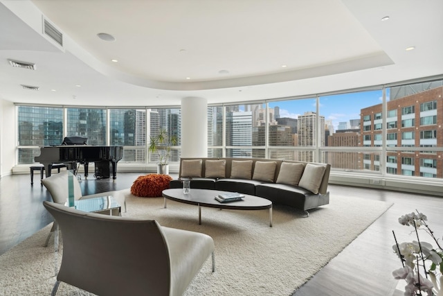 sunroom with a raised ceiling