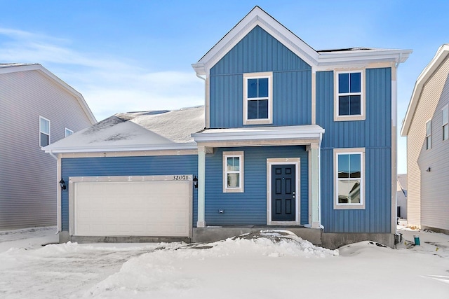 view of front of property featuring a garage