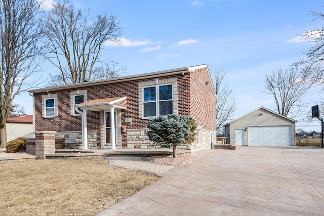 raised ranch with an outbuilding and a garage