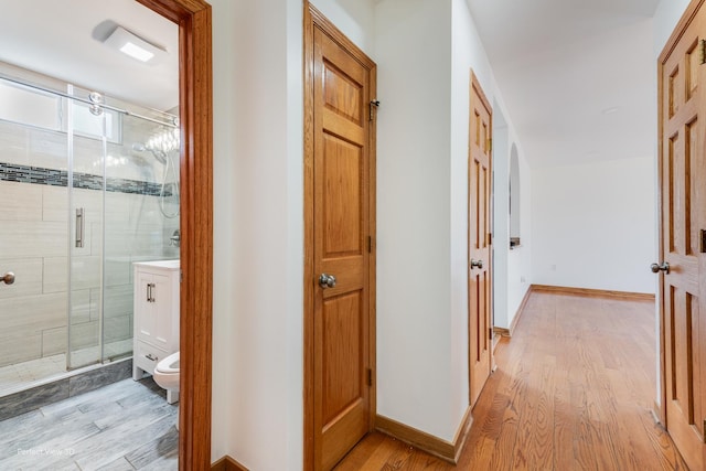 hall featuring light hardwood / wood-style floors