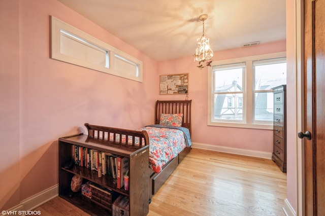 bedroom featuring light wood-type flooring