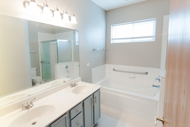 full bathroom with a bath, double vanity, a sink, and a shower with shower door