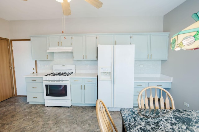 kitchen featuring tasteful backsplash, white appliances, light countertops, and under cabinet range hood