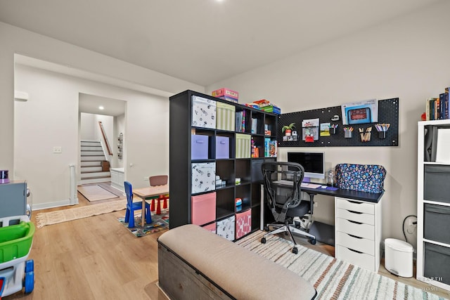 office featuring wood finished floors and baseboards