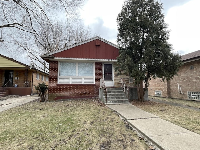 bungalow with a front yard