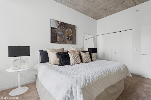 carpeted bedroom with a closet