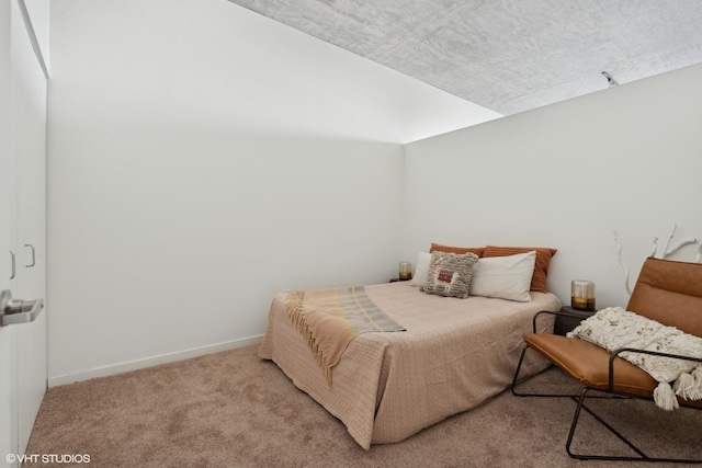 bedroom with light carpet