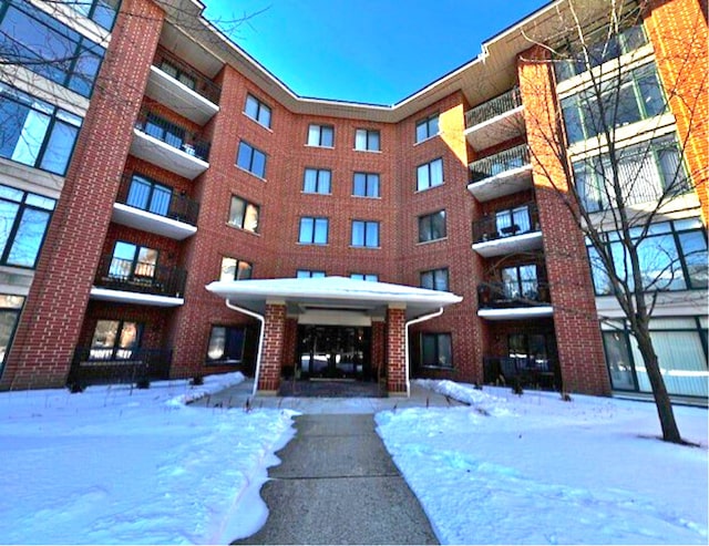 view of snow covered property