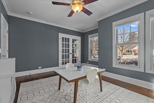 office area featuring crown molding, wood finished floors, and french doors