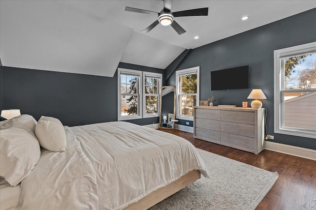 bedroom with baseboards, a ceiling fan, lofted ceiling, dark wood-type flooring, and recessed lighting