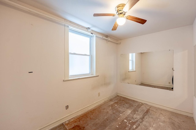 spare room with ceiling fan